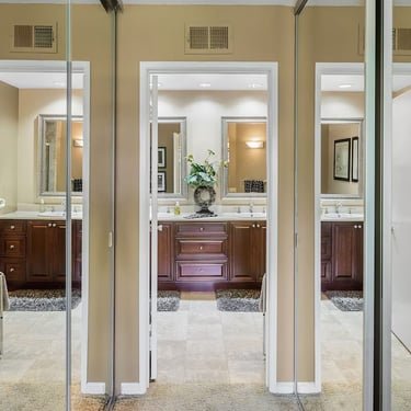 Bathroom hallway with mirrors